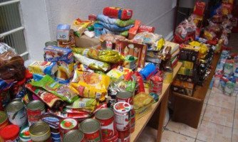 Natal Solidário arrecada alimentos em São José dos Quatro Marcos